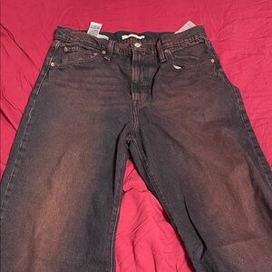 Reddish purple baggy Levi’s jeans